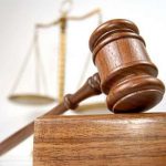 A stock photo of Scales and a gavel