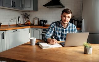 A man on a laptop, researching about family and relationship law